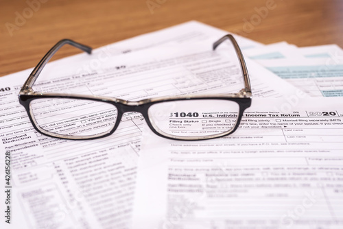 USA tax form 1040 with eyeglasses