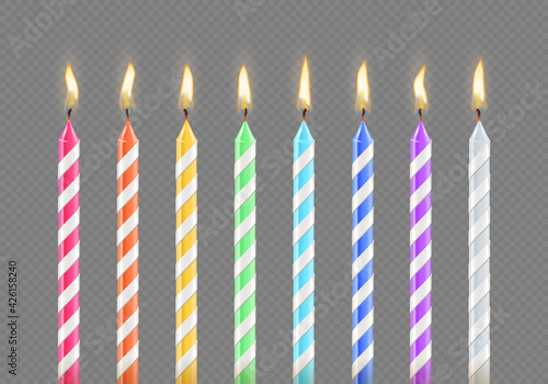 Birthday cake candles with burning flame isolated on transparent background. Realistic festive flickered candlelight from colored holiday party wax candles. Vector 3d illustration of design element