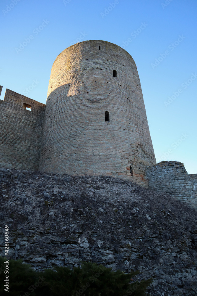 medieval Ivngorod fortress wall and tower at the evening