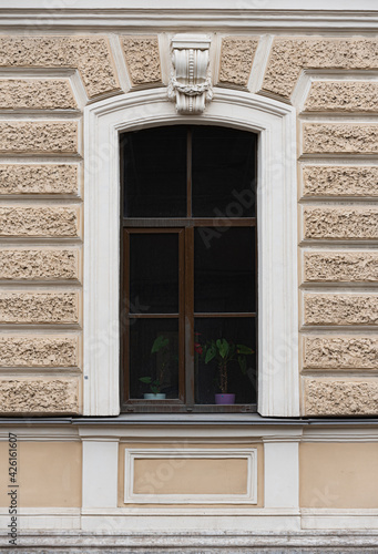 Windows on old city facades  with decorative elements