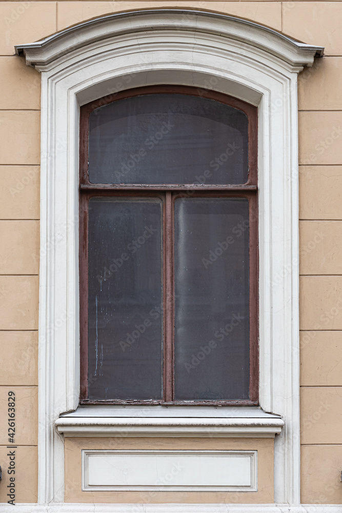 Windows on old city facades, with decorative elements