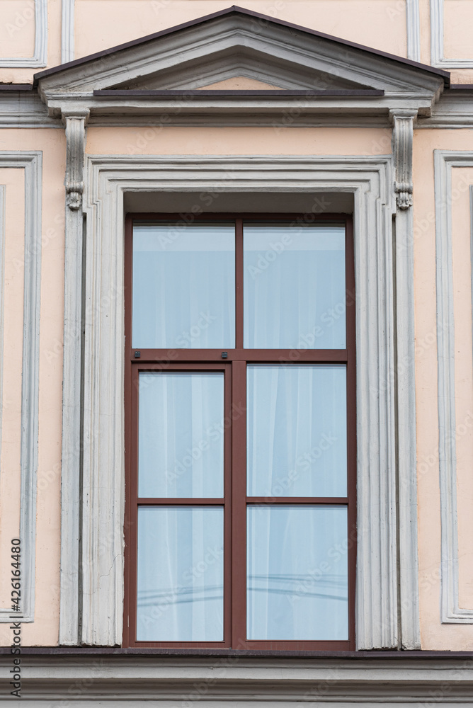 Windows on old city facades, with decorative elements Windows on old city facades, with decorative elements