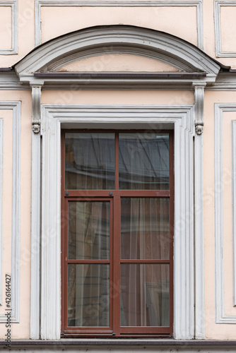 Windows on old city facades, with decorative elements