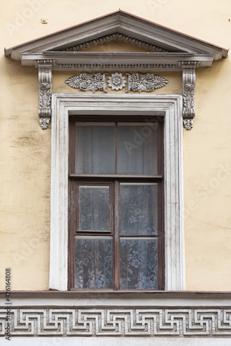 Windows on old city facades, with decorative elements