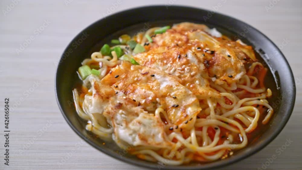ramen noodles with gyoza or pork dumplings - Asian food style ramen noodles with gyoza or pork dumplings - Asian food style
