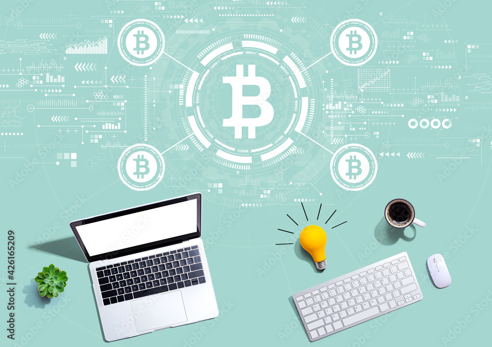 Bitcoin theme with computers with a light bulb Bitcoin theme with computers with a light bulb