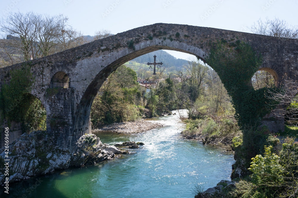 Beautiful bridge over Sella river at Cangas de Onis, Asturias. Roman bridge, sunny day and no people