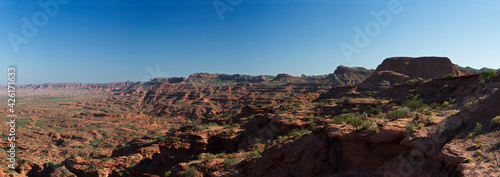Panorama view of the red and orange desert. The sandstone cliffs, canyon and rocky mountains in Sierra de las Quijadas national park in San Luis, Argentina.