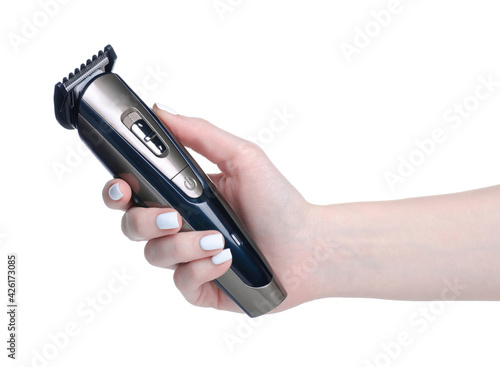 Hair clipper trimmer in hand on white background isolation