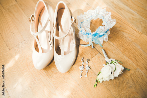 White stylish wedding shoes for bride. Close-up