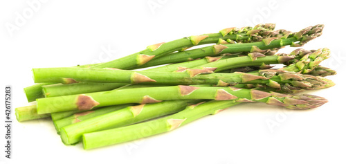 green asparagus on white background photo