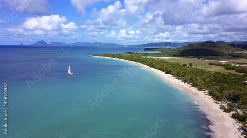 Aerial view of a white sand beach in Martinique