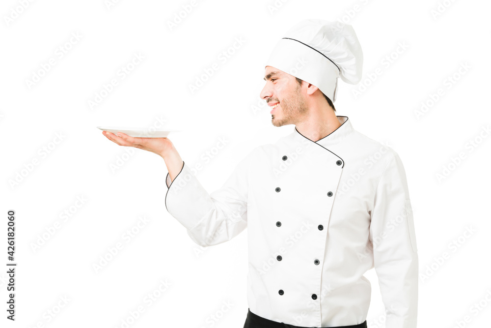 Happy professional cook making a new restaurant menu Happy professional cook making a new restaurant menu