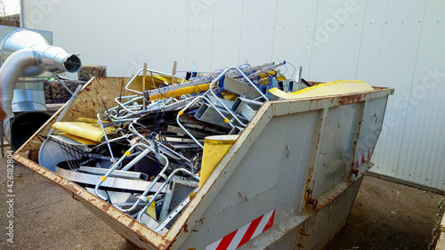a container full of metallic scrap