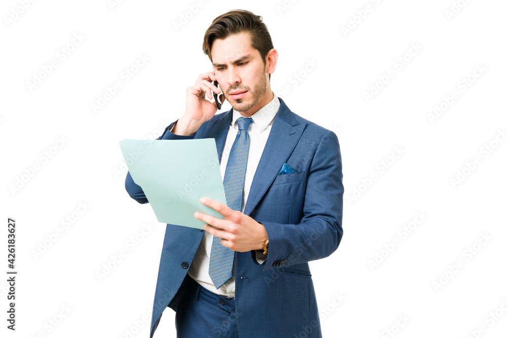 Handsome businessman working at his office Handsome businessman working at his office