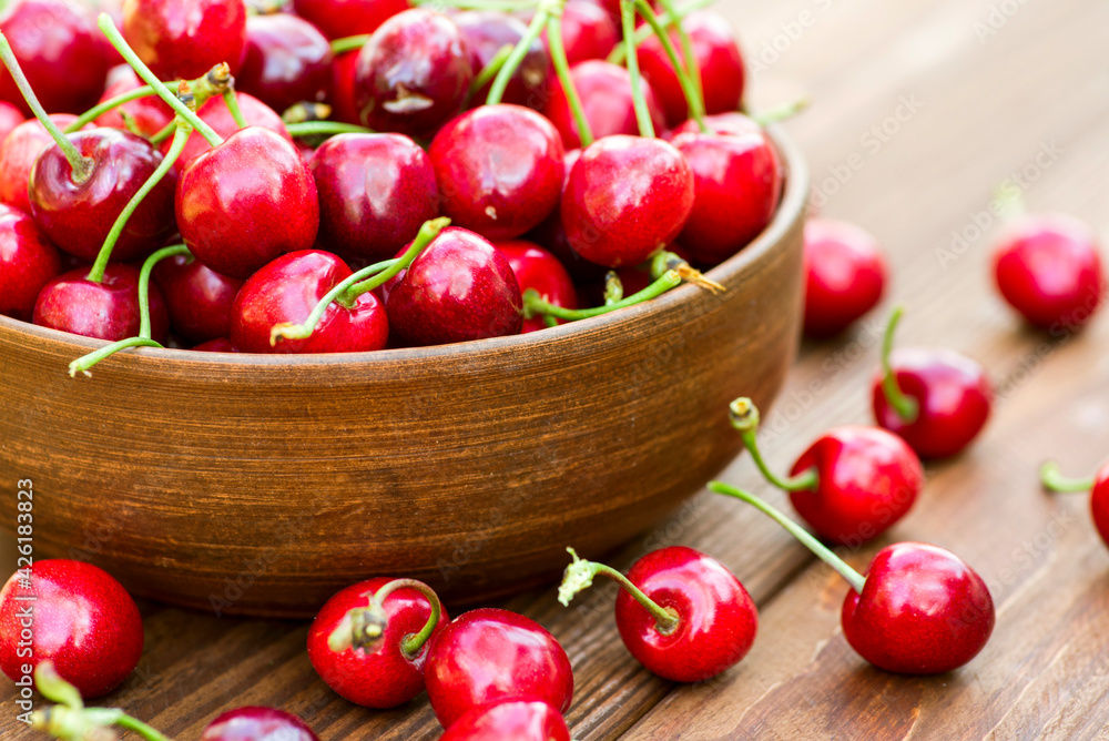 Ripe juicy berries cherries in a bowl. Freshly picked ripe cherries in a bowl Ripe juicy berries cherries in a bowl. Freshly picked ripe cherries in a bowl