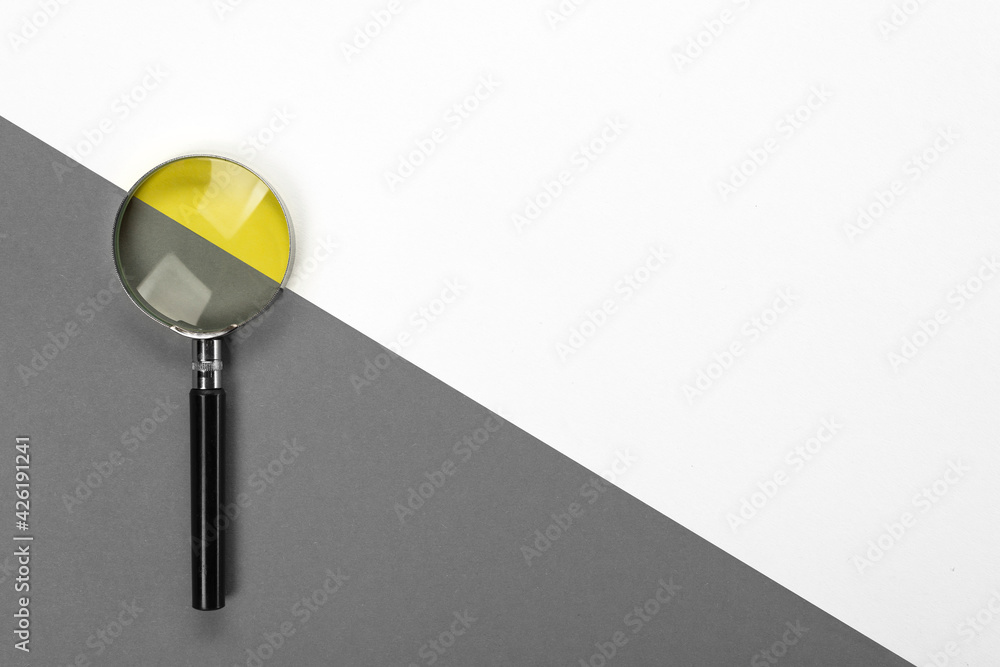 Magnifying glass on a colored background with a place for your text Magnifying glass on a colored background with a place for your text