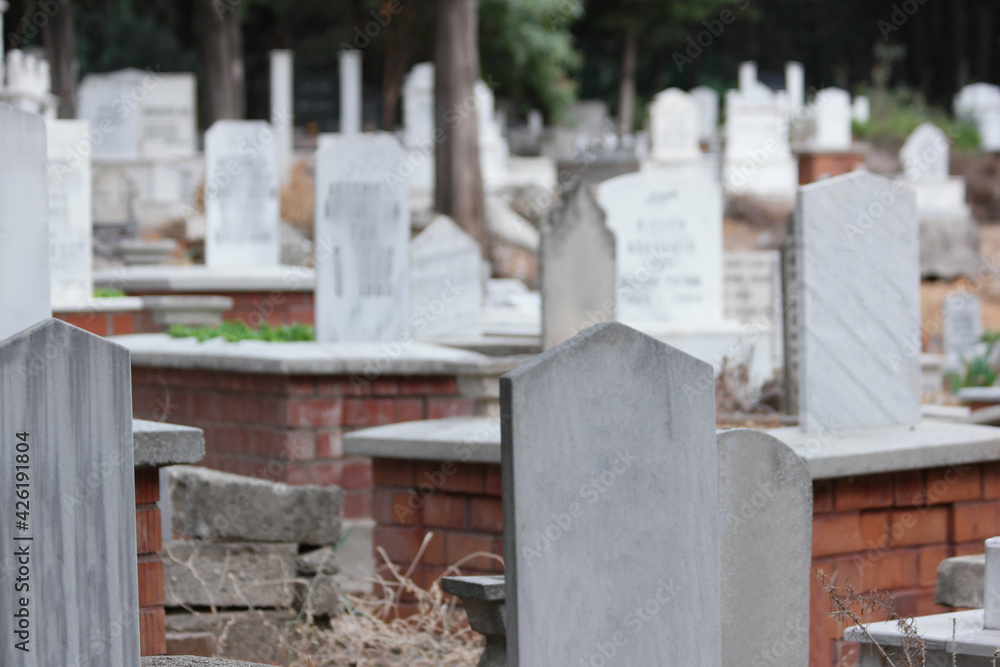 Grey headstone on grave at Muslim cemetery. Grey headstone on grave at Muslim cemetery.