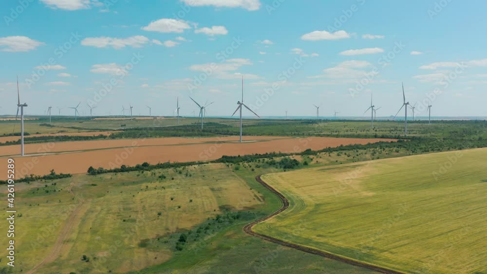Drone shot of windmills in the field Drone shot of windmills in the field