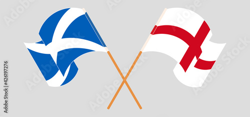 Crossed and waving flags of Scotland and England