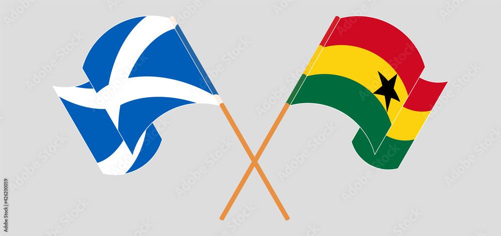 Crossed and waving flags of Scotland and Ghana Crossed and waving flags of Scotland and Ghana