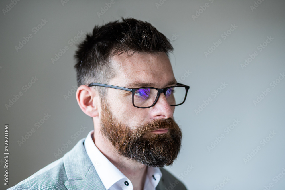 portrait of successful businessman in office