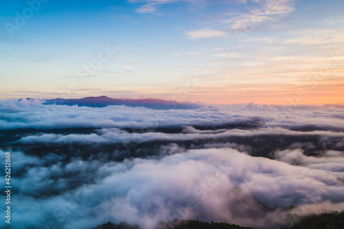 Sunrise over the mountains (misty low clouds) © zkcristian
