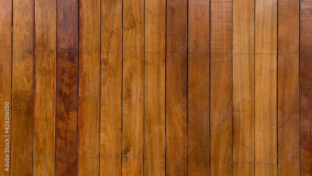 Naklejka premium brown wood texture. Background dark old wooden panels.