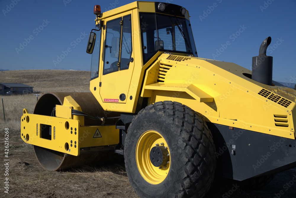 Full view or a heavy-duty road roller.