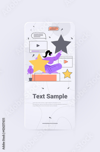 businesswoman holding review stars rating customer feedback satisfaction level online survey concept