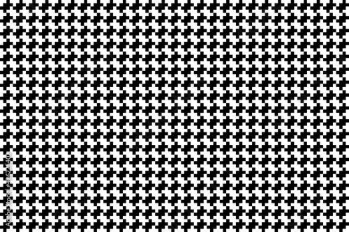 Patrón de adoquines blancos y negros creando mosaico vertical