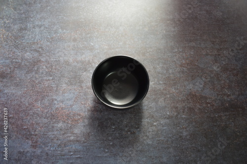 Black empty round ceramic bowl