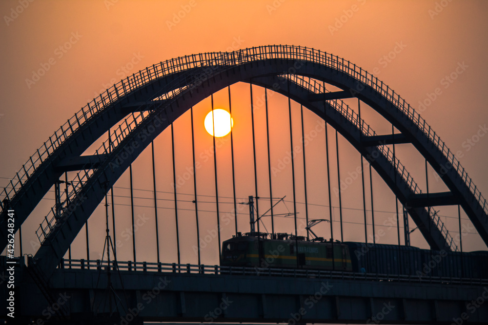 The Godavari Arch Bridge is a bowstring-girder bridge that spans the Godavari River in Rajahmundry, India. It is the latest of the three bridges that span the Godavari river at Rajahmundry. The Godavari Arch Bridge is a bowstring-girder bridge that spans the Godavari River in Rajahmundry, India. It is the latest of the three bridges that span the Godavari river at Rajahmundry.