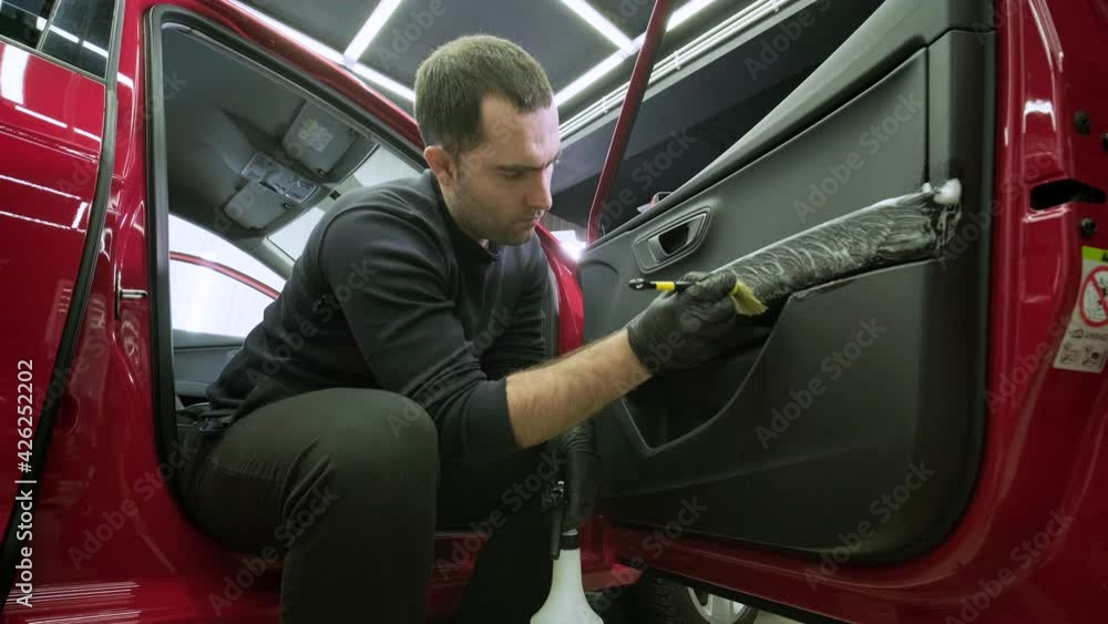 Professional car cleaning. Сar wash. Dry cleaning and detailing of the cabin. Deep cleaning of the body, seat cleaning. Wiping foam in car wash. Cleaning the car panel from dust. A vacuum cleaner Professional car cleaning. Сar wash. Dry cleaning and detailing of the cabin. Deep cleaning of the body, seat cleaning. Wiping foam in car wash. Cleaning the car panel from dust. A vacuum cleaner