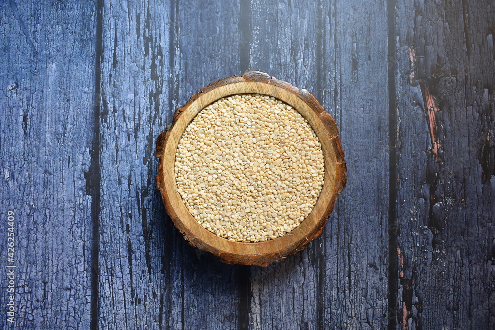 Raw split dried white Urad lentils Raw split dried white Urad lentils