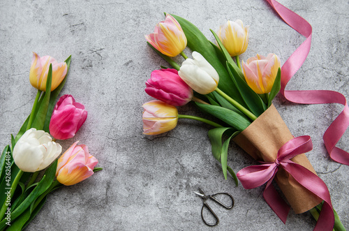 Spring tulips on a concrete background #426256484