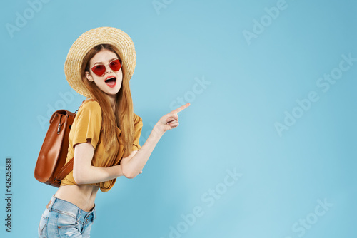 Cute fashionable woman summer clothes fun emotions blue background