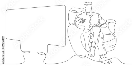 Young man watching television at home on the couch. One continuous drawing line logo single hand drawn art doodle isolated minimal illustration.