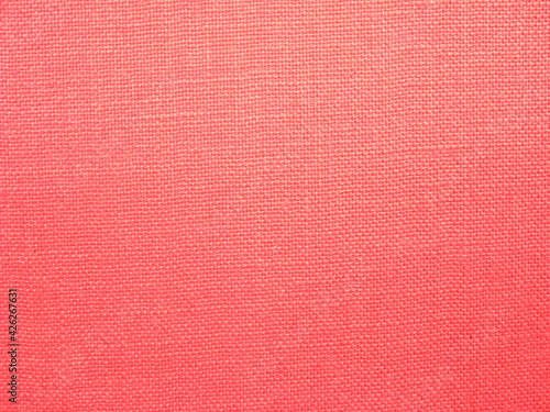 Red color Burlap fabric textured background
