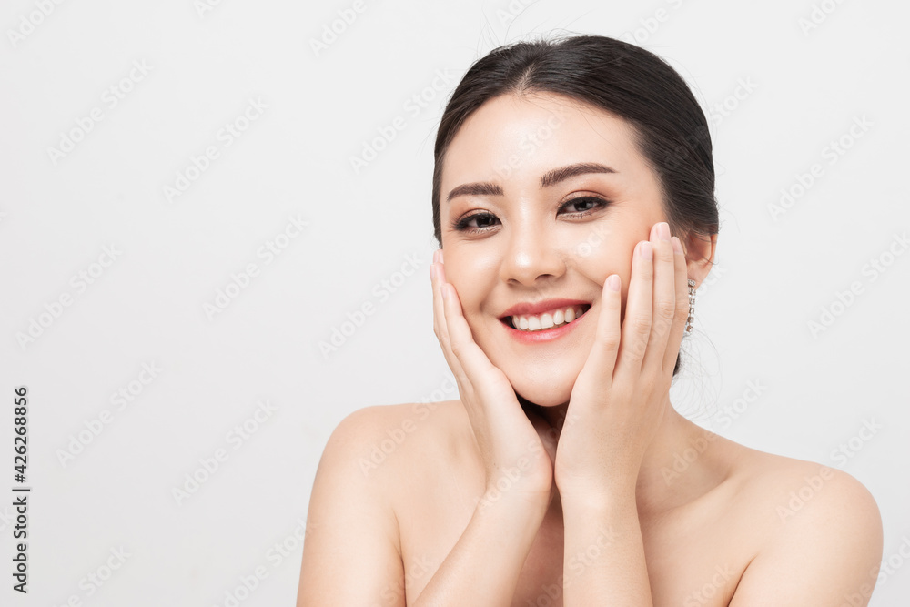 Beautiful Asian woman . Portrait Asian girl cheerful smile in studio white background. Beauty of women. Beauty and makeup concept. Beautiful Asian woman . Portrait Asian girl cheerful smile in studio white background. Beauty of women. Beauty and makeup concept.