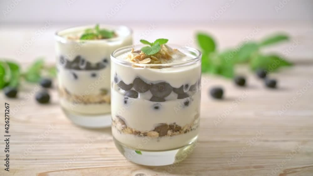 fresh blueberries and yogurt with granola - Healthy food style fresh blueberries and yogurt with granola - Healthy food style