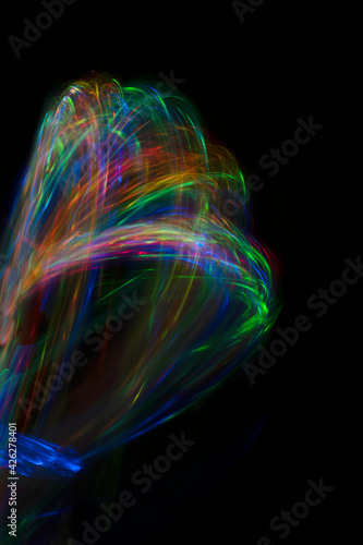 Abstract colorful blurred background on black