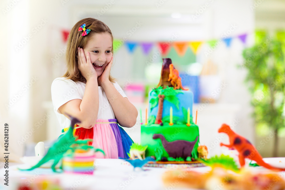Kids birthday party. Dinosaur theme cake.