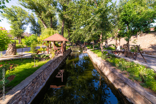 Small narrow water canal in a park