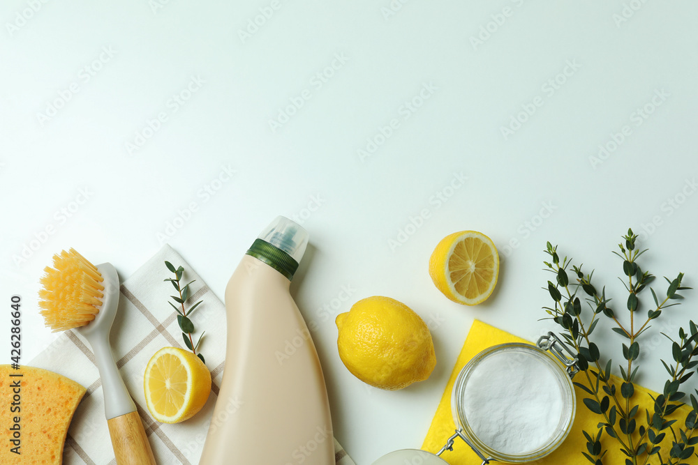 Cleaning concept with eco friendly cleaning tools on white background Cleaning concept with eco friendly cleaning tools on white background