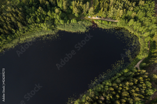 Lake Podnieku in summer evening, captured from above. 