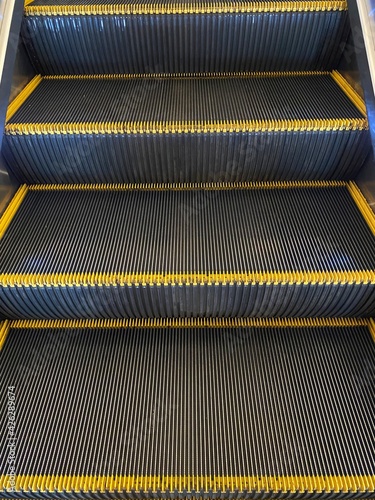 Modern escalator at metro station.