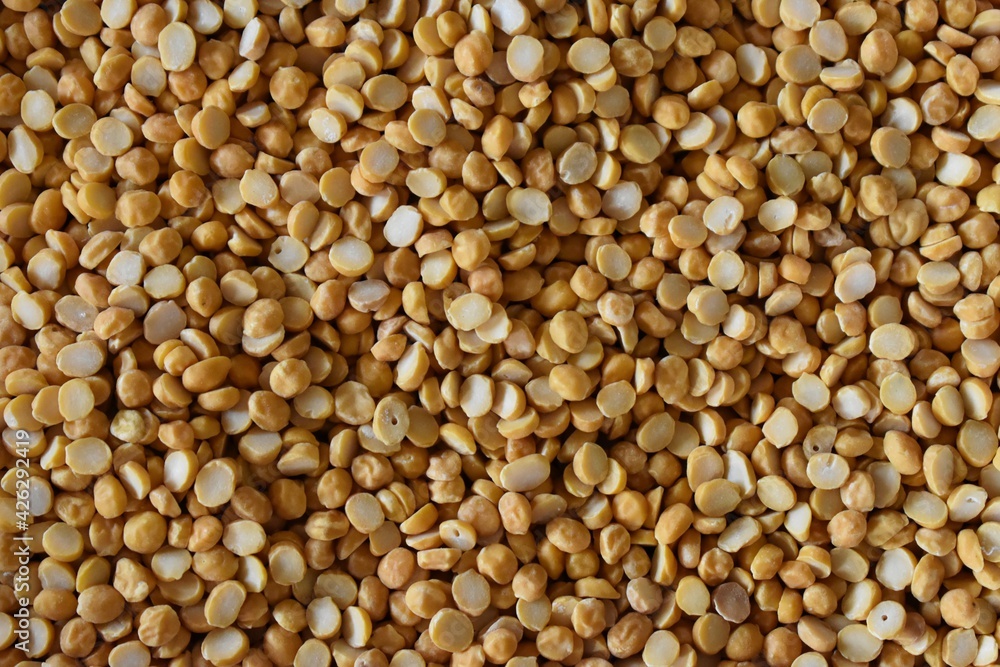 yellow moong mung dal lentil pulse beans in full frame yellow moong mung dal lentil pulse beans in full frame