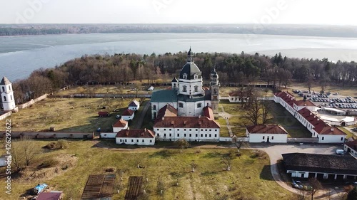 Pazaislis Monastery complex in aerial orbiting view of sunny day photo