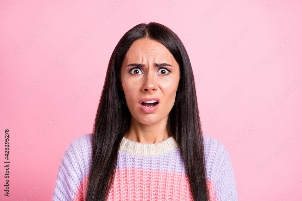 Photo of stressed brunette nice lady wear sweater isolated on pastel pink color background Photo of stressed brunette nice lady wear sweater isolated on pastel pink color background